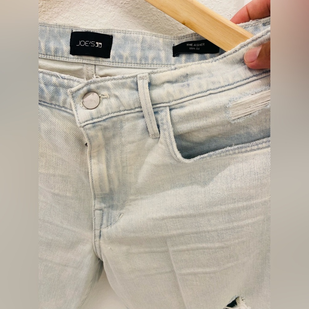 Joe's Jeans The Asher slim-fit distressed Jeans perfect for a comfort look .